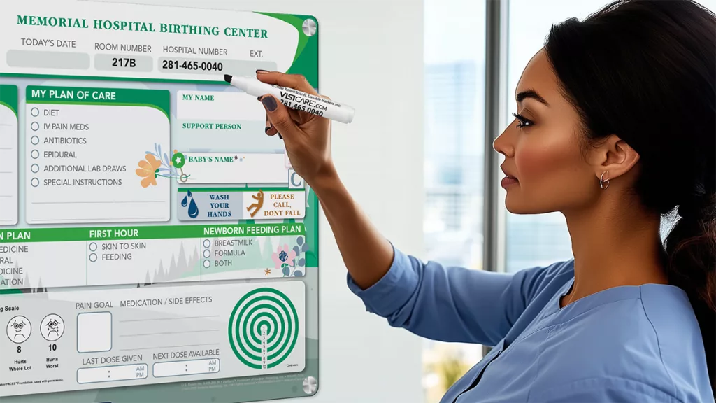 Nurse writes on custom glass board for Women's health Postpartum in patient room