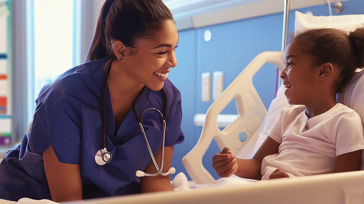 Nurse and patient in pediatric hopsital room with custom healthcare patient whiteboard