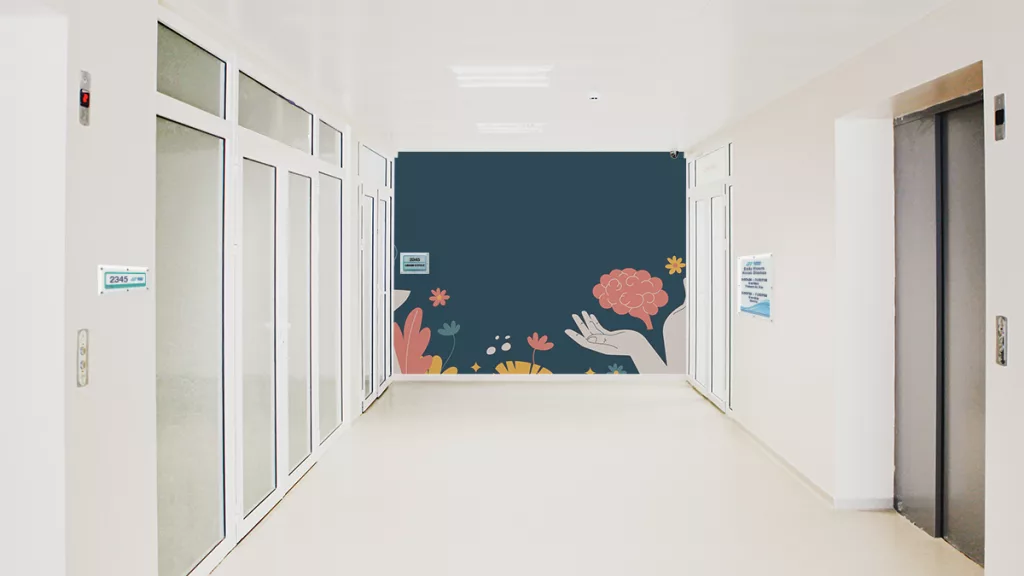 Medical facility hallway with custom VisiCare Safety Board wayfinding signage