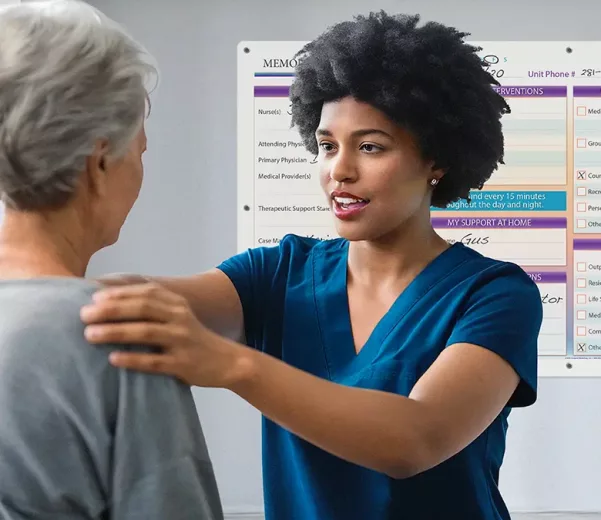 Patient and Nurse in Behavioral Health hospital room with custom Safety Board