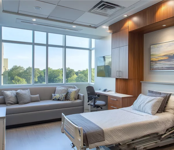 Modern patient room with best in market for ROI VisiCareHD Digital Boards for patient rooms